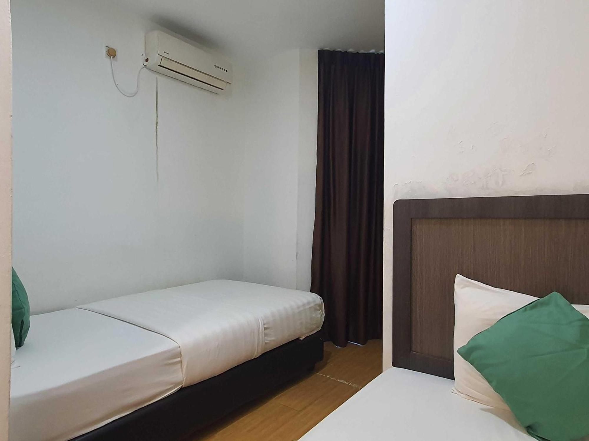 Oyo 91053 Signature Inn Miri Exterior photo