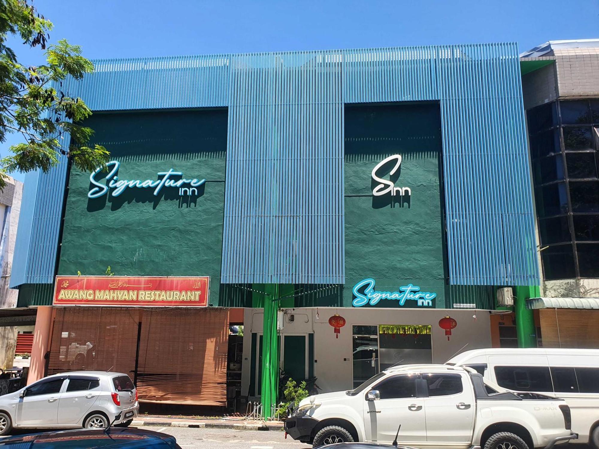 Oyo 91053 Signature Inn Miri Exterior photo